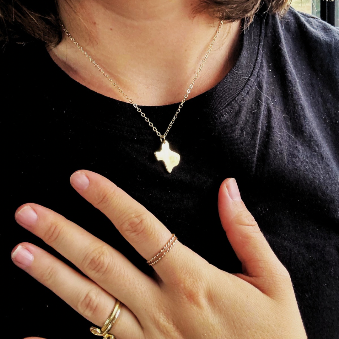 Ethically made Texas charm necklace with donation to disaster relief