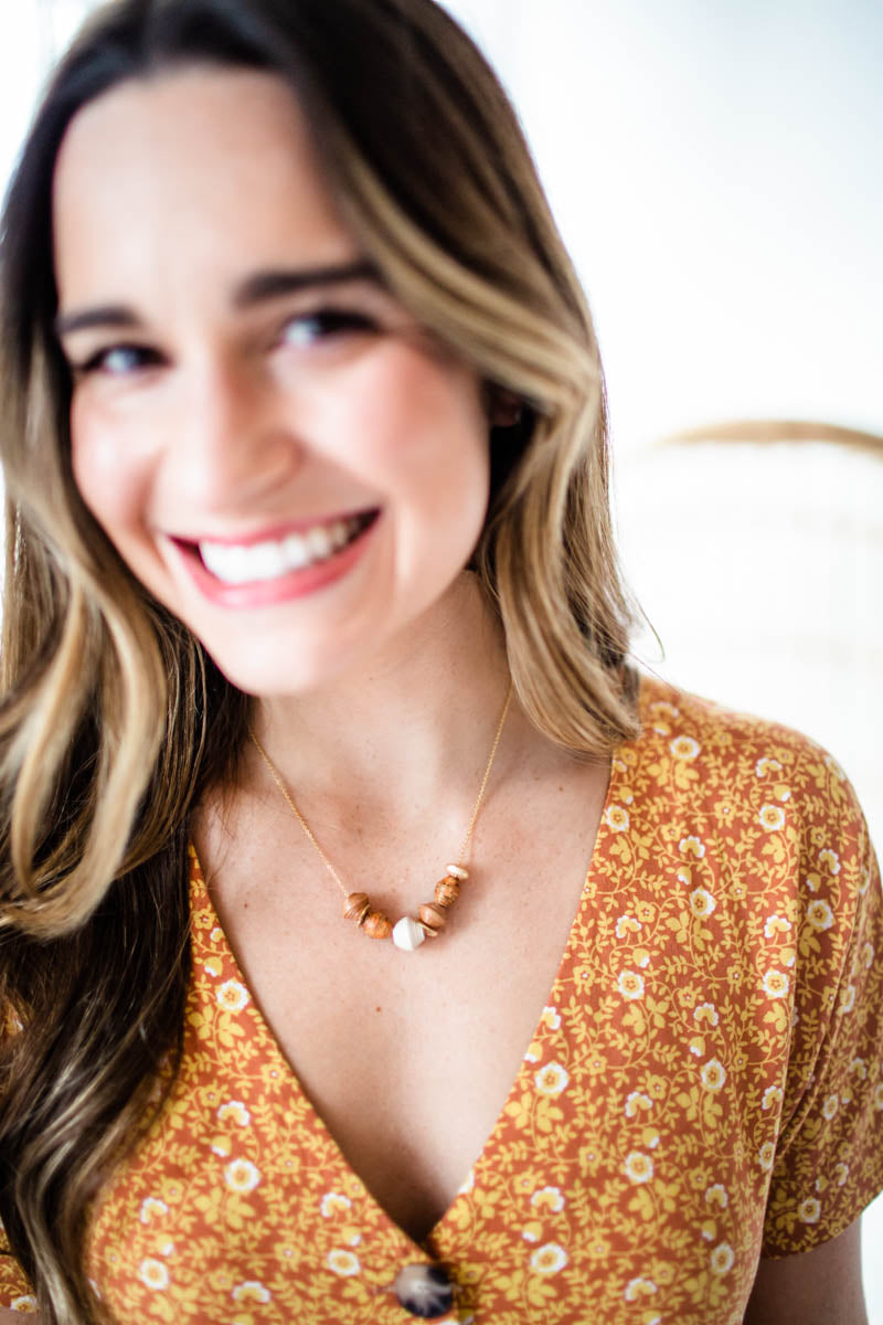 ethically made necklace on 18k gold plated chain with handmade paper beads
